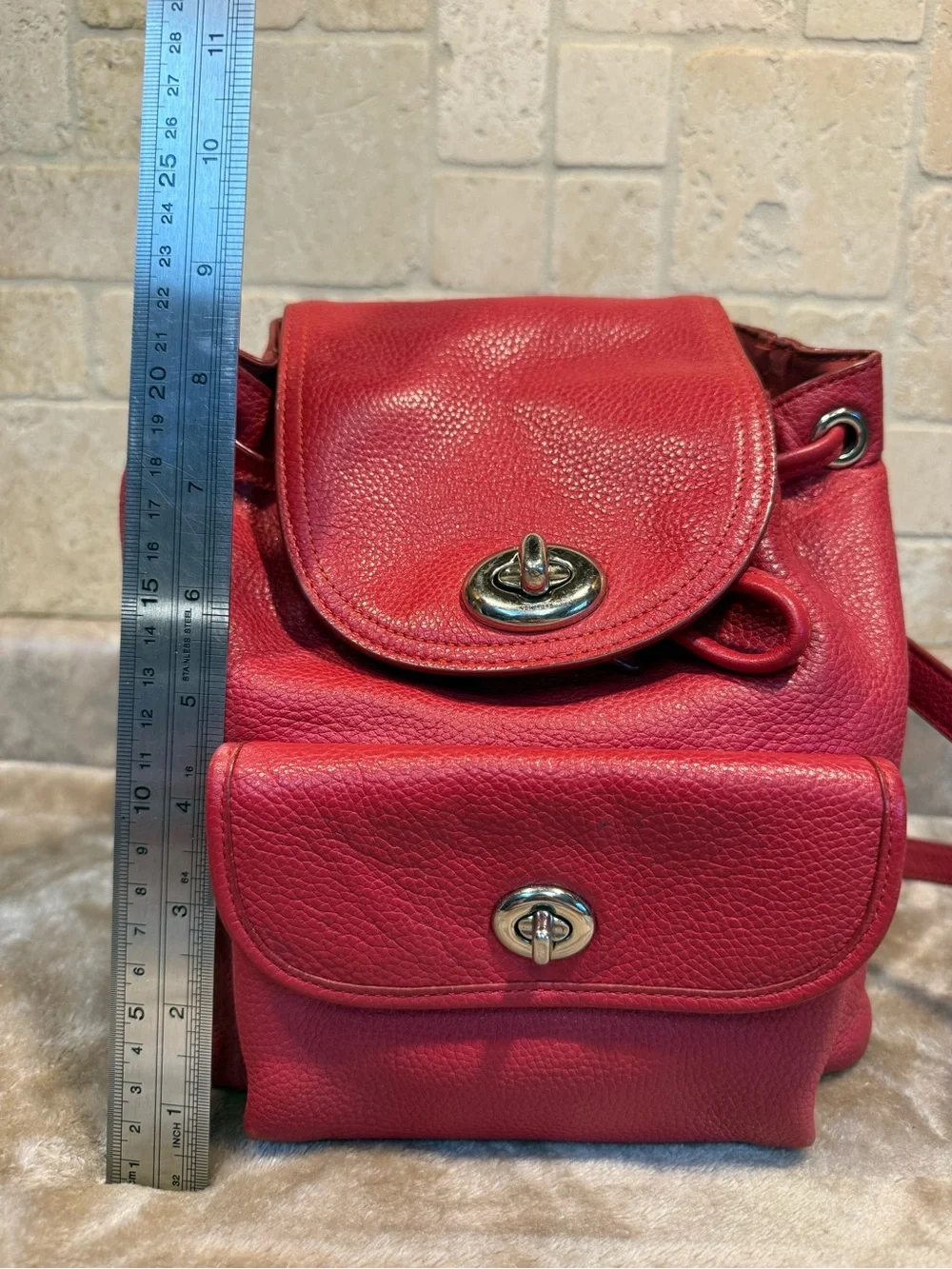 Coach Mini Red Pebble Leather Drawstring Backpack with Front Pocket
